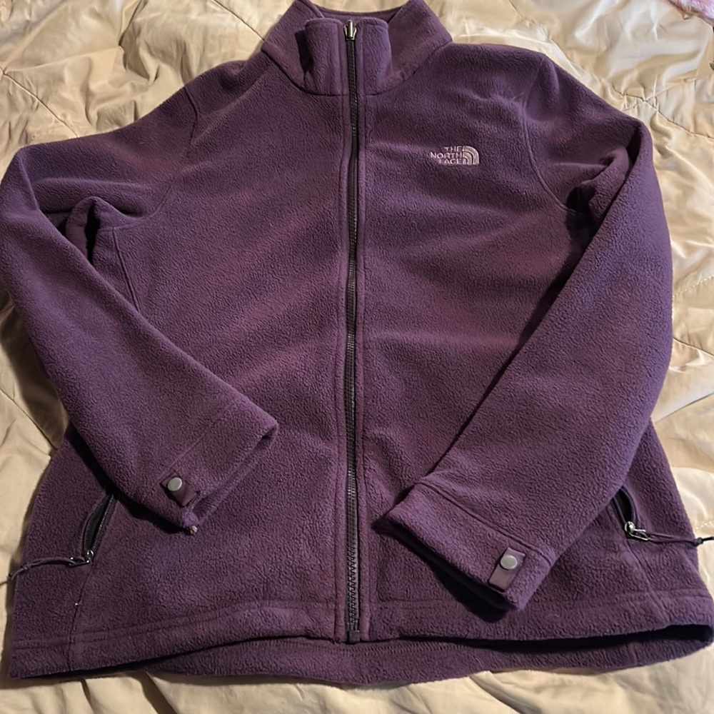 The north face women’s size medium purple zip up fleece